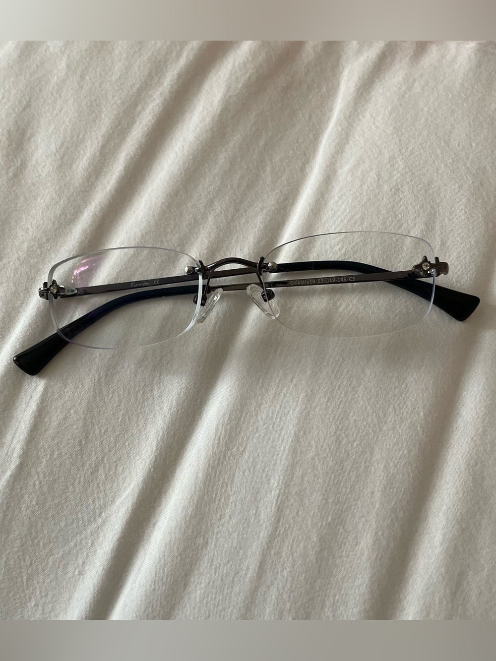 trendy black rimless clear glasses with diamond details